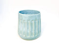 Light blue ceramic tumbler with vertical ribbed design 