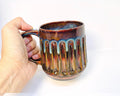 Ceramic doric design mug with tiger's eye and stone denim glaze