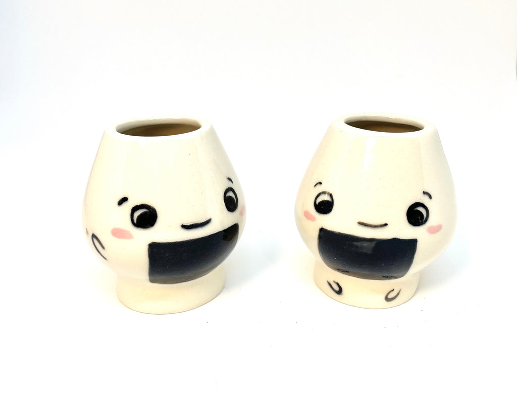 Two ceramic matcha whisk holder  with Onigiri face design 